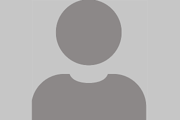 Eine graue Silhouette einer Person auf hellgrauem Hintergrund, die häufig als Platzhalter für ein Profilbild verwendet wird.